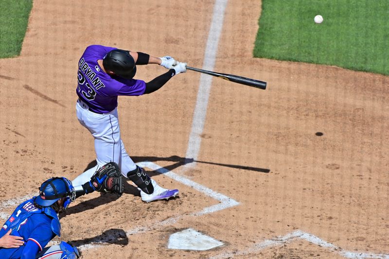 Mar 6, 2023; Salt River Pima-Maricopa, Arizona, USA; Colorado Rockies left fielder Kris Bryant (23) flies out in the third inning against the Texas Rangers during a Spring Training game at Salt River Fields at Talking Stick. Mandatory Credit: Matt Kartozian-USA TODAY Sports