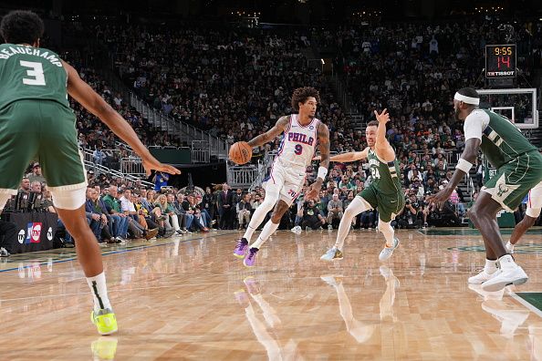 MILWAUKEE, WI - OCTOBER 26: Kelly Oubre Jr. #9 of the Philadelphia 76ers drives to the basket during the game against the Milwaukee Bucks on October 26, 2023 at the Fiserv Forum Center in Milwaukee, Wisconsin. NOTE TO USER: User expressly acknowledges and agrees that, by downloading and or using this Photograph, user is consenting to the terms and conditions of the Getty Images License Agreement. Mandatory Copyright Notice: Copyright 2023 NBAE (Photo by Jesse D. Garrabrant/NBAE via Getty Images).