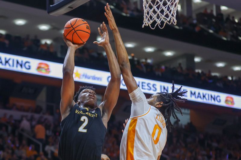 Feb 17, 2024; Knoxville, Tennessee, USA; Vanderbilt Commodores forward Ven-Allen Lubin (2) goes to the basket against Tennessee Volunteers forward Jonas Aidoo (0) during the first half at Thompson-Boling Arena at Food City Center. Mandatory Credit: Randy Sartin-USA TODAY Sports