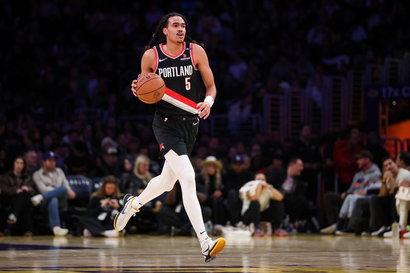 LOS ANGELES, CALIFORNIA - DECEMBER 08: Dalano Banton #5 of the Portland Trail Blazers handles the ball in the first half against the Los Angeles Lakers at Crypto.com Arena on December 08, 2024 in Los Angeles, California. NOTE TO USER: User expressly acknowledges and agrees that, by downloading and or using this Photograph, user is consenting to the terms and conditions of the Getty Images License Agreement. (Photo by Meg Oliphant/Getty Images)