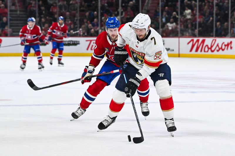 Mar 15, 2025; Montreal, Quebec, CAN; Florida Panthers defenseman Dmitry Kulikov (7) defends the puck agains tMontreal Canadiens right wing Josh Anderson (17) in the first period at Bell Centre. Mandatory Credit: David Kirouac-Imagn Images