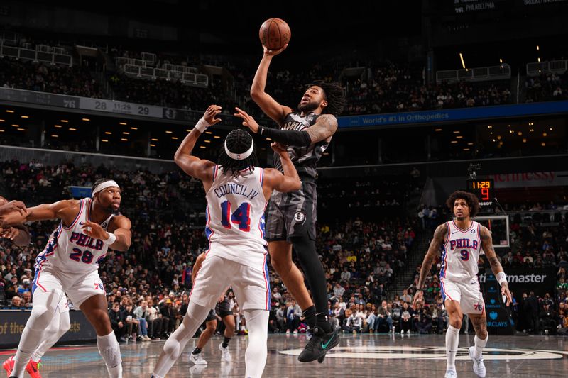 BROOKLYN, NY - FEBRUARY 12: Trendon Watford #9 of the Brooklyn Nets drives to the basket during the game against the Philadelphia 76ers on February 12, 2025 at Barclays Center in Brooklyn, New York. NOTE TO USER: User expressly acknowledges and agrees that, by downloading and or using this Photograph, user is consenting to the terms and conditions of the Getty Images License Agreement. Mandatory Copyright Notice: Copyright 2025 NBAE (Photo by Jesse D. Garrabrant/NBAE via Getty Images)