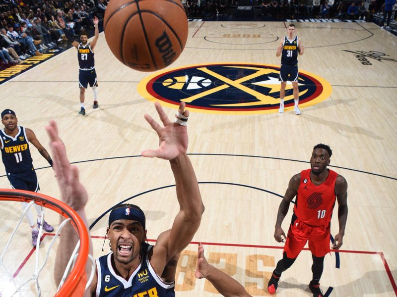 DENVER, CO - JANUARY 17: Zeke Nnaji #22 of the Denver Nuggets shoots the ball during the game against the Portland Trail Blazers on January 17, 2023 at the Ball Arena in Denver, Colorado. NOTE TO USER: User expressly acknowledges and agrees that, by downloading and/or using this Photograph, user is consenting to the terms and conditions of the Getty Images License Agreement. Mandatory Copyright Notice: Copyright 2023 NBAE (Photo by Garrett Ellwood/NBAE via Getty Images)