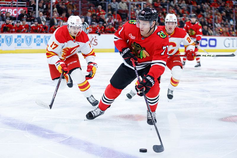 Jan 13, 2025; Chicago, Illinois, USA; Chicago Blackhawks left wing Taylor Hall (71) looks to pass the puck against the Calgary Flames during the first period at United Center. Mandatory Credit: Kamil Krzaczynski-Imagn Images