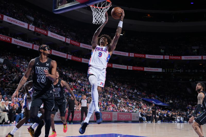 PHILADELPHIA, PA - APRIL 14: Kelly Oubre Jr. #9 of the Philadelphia 76ers drives to the basket during the game against the Brooklyn Nets on April 14, 2024 at the Wells Fargo Center in Philadelphia, Pennsylvania NOTE TO USER: User expressly acknowledges and agrees that, by downloading and/or using this Photograph, user is consenting to the terms and conditions of the Getty Images License Agreement. Mandatory Copyright Notice: Copyright 2024 NBAE (Photo by Jesse D. Garrabrant/NBAE via Getty Images)