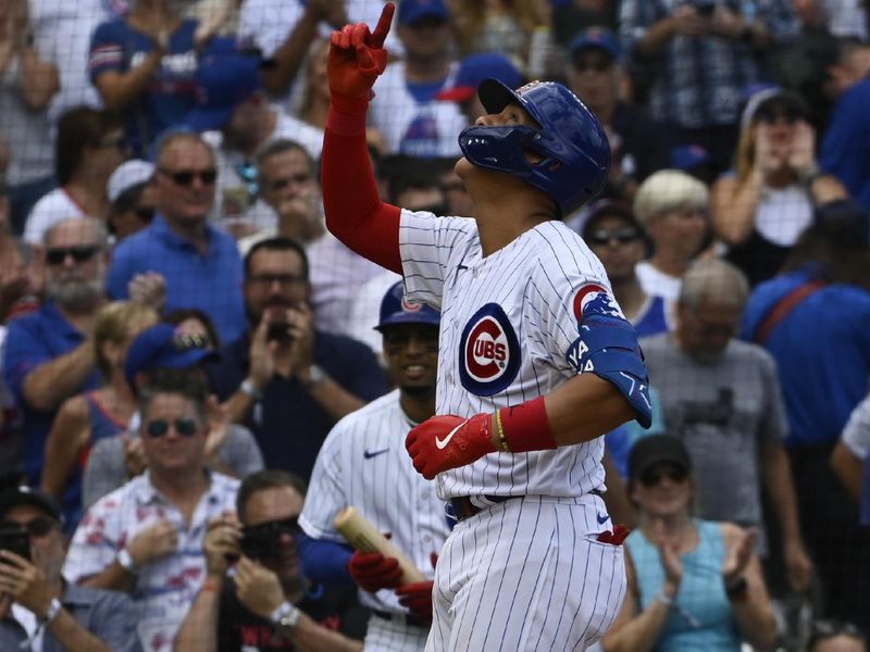 Sep 6, 2023; Chicago, Illinois, USA;  Chicago Cubs catcher Miguel Amaya (6) points after he he hits a homer run against the San Francisco Giants during the fourth inning at Wrigley Field. Mandatory Credit: Matt Marton-USA TODAY Sports