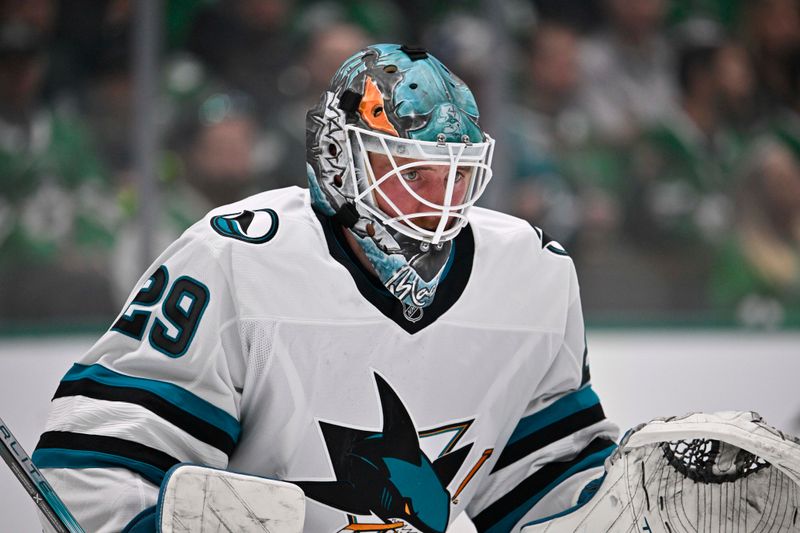 Oct 15, 2024; Dallas, Texas, USA; San Jose Sharks goaltender Mackenzie Blackwood (29) faces the Dallas Stars attack during the second period at the American Airlines Center. Mandatory Credit: Jerome Miron-Imagn Images