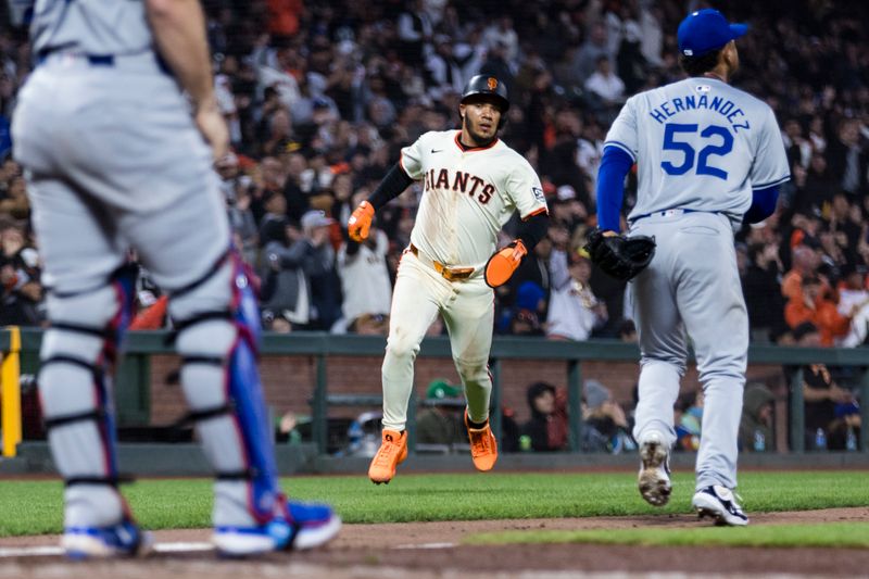 May 15, 2024; San Francisco, California, USA; San Francisco Giants second baseman Thairo Estrada (39) runs home to score against the Los Angeles Dodgers during the sixth inning at Oracle Park. Mandatory Credit: John Hefti-USA TODAY Sports