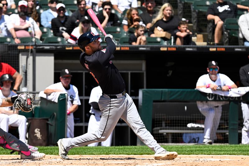 May 12, 2024; Chicago, Illinois, USA;  Cleveland Guardians first base David Fry (6) watches his two-run home run against the Chicago White Sox during the fourth inning at Guaranteed Rate Field. Mandatory Credit: Matt Marton-USA TODAY Sports