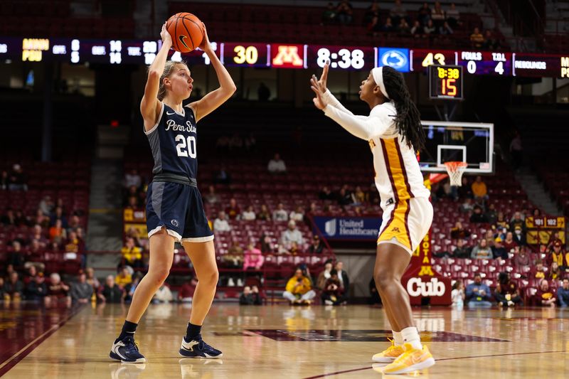 Jan 31, 2024; Minneapolis, Minnesota, USA; Penn State Nittany Lions guard Makenna Marisa (20) looks to pass as Minnesota Golden Gophers guard Janay Sanders (30) defends during the second half at Williams Arena. Mandatory Credit: Matt Krohn-USA TODAY Sports