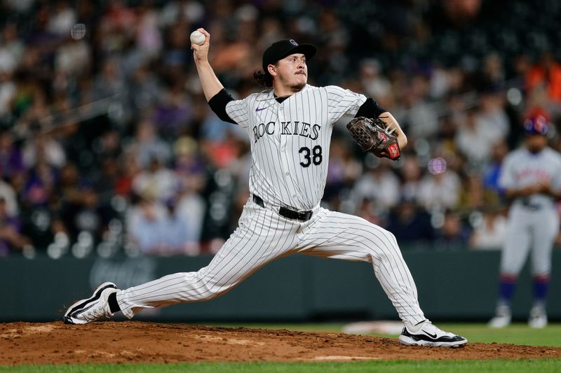 Aug 6, 2024; Denver, Colorado, USA; Colorado Rockies relief pitcher Victor Vodnik (38) pitches in the ninth inning against the New York Mets at Coors Field. Mandatory Credit: Isaiah J. Downing-USA TODAY Sports