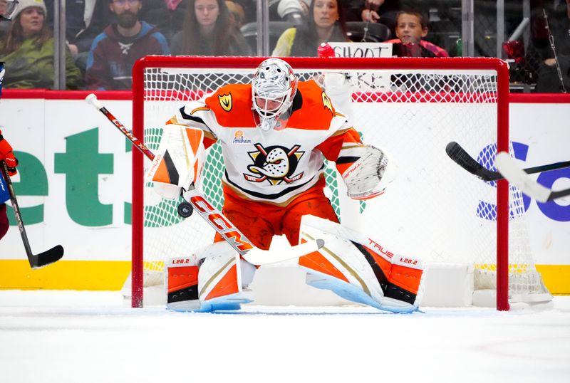 Oct 18, 2024; Denver, Colorado, USA; Anaheim Ducks goaltender Lukas Dostal (1) makes a stick save in the first period against the Colorado Avalanche at Ball Arena. Mandatory Credit: Ron Chenoy-Imagn Images