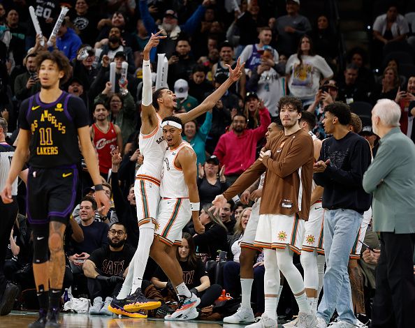 SAN ANTONIO, TX - DECEMBER 15:  Victor Wembanyama #1 of the San Antonio Spurs celebrates with Keldon Johnson #3 late  in the second half against the Los Angeles Lakers at Frost Bank Center on December  15, 2023 in San Antonio, Texas. NOTE TO USER: User expressly acknowledges and agrees that, by downloading and or using this photograph, User is consenting to terms and conditions of the Getty Images License Agreement. (Photo by Ronald Cortes/Getty Images)