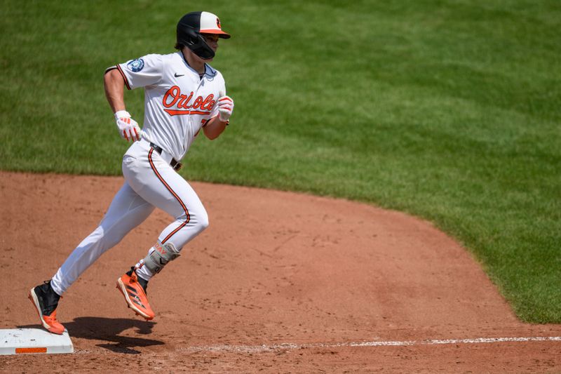 Jul 31, 2024; Baltimore, Maryland, USA; Baltimore Orioles second baseman Jackson Holliday (7) rounds third base after hitting a home run against the Toronto Blue Jays during the fifth inning at Oriole Park at Camden Yards. Mandatory Credit: Reggie Hildred-USA TODAY Sports