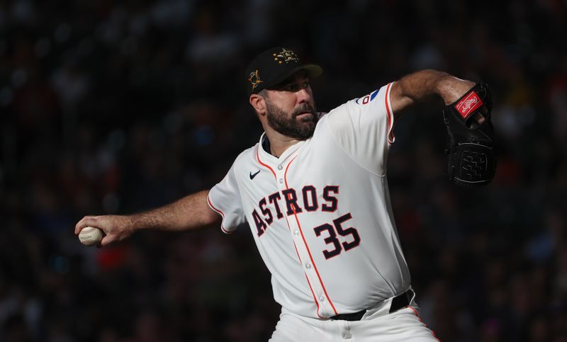 May 18, 2024; Houston, Texas, USA; Houston Astros starting pitcher Justin Verlander (35) pitches against the Milwaukee Brewers in the first inning at Minute Maid Park. Mandatory Credit: Thomas Shea-USA TODAY Sports