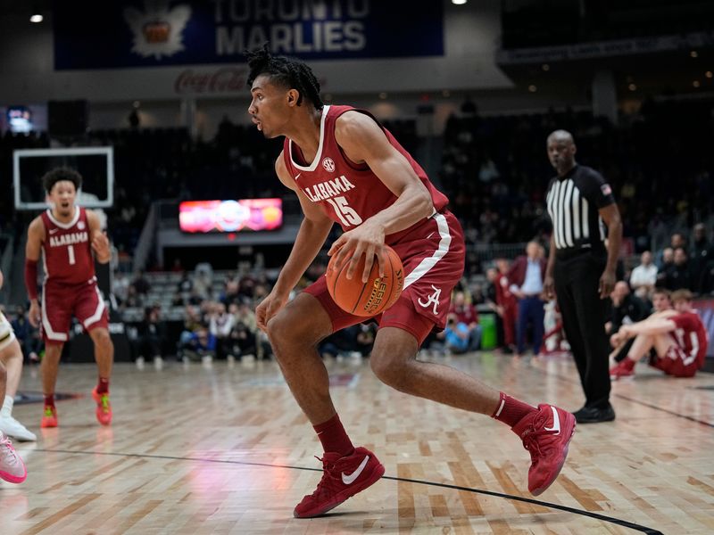 Dec 9, 2023; Toronto, Ontario, CAN; Alabama Crimson Tide forward Jarin Stevenson (15) controls the ball against the Purdue Boilermakers during the first half at Coca-Cola Coliseum. Mandatory Credit: John E. Sokolowski-USA TODAY Sports