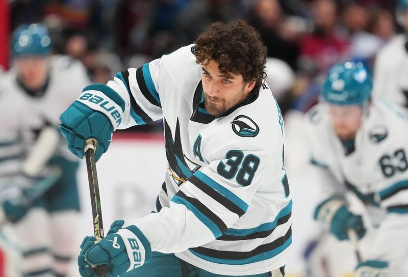 Nov 26, 2025; Denver, Colorado, USA; San Jose Sharks defenseman Mario Ferraro (38) before the game against the Colorado Avalanche at Ball Arena. Mandatory Credit: Ron Chenoy-Imagn Images