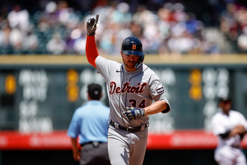 Jul 2, 2023; Denver, Colorado, USA; Detroit Tigers catcher Jake Rogers (34) gestures as he rounds the bases on a solo home run in the fourth inning against the Colorado Rockies at Coors Field. Mandatory Credit: Isaiah J. Downing-USA TODAY Sports