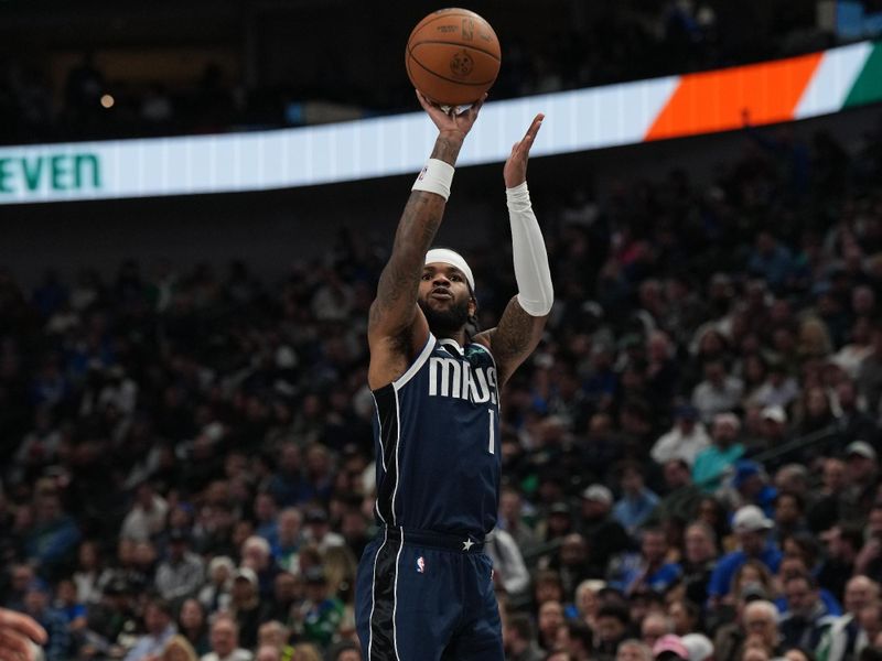 DALLAS, TX - JANUARY 27:  Jaden Hardy #1 of the Dallas Mavericks shoots a three point basket during the game against the Washington Wizards on January 27, 2025 at American Airlines Center in Dallas, Texas. NOTE TO USER: User expressly acknowledges and agrees that, by downloading and or using this photograph, User is consenting to the terms and conditions of the Getty Images License Agreement. Mandatory Copyright Notice: Copyright 2025 NBAE (Photo by Glenn James/NBAE via Getty Images)