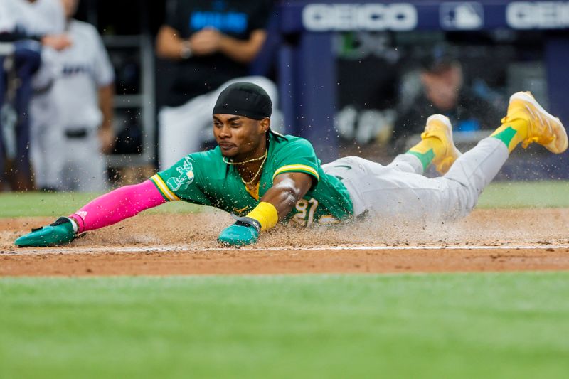 Jun 4, 2023; Miami, Florida, USA; Oakland Athletics center fielder Esteury Ruiz (1) scores on a RBI double by right fielder Ramon Laureano (not pictured) against the Miami Marlins during the third inning  at loanDepot Park. Mandatory Credit: Sam Navarro-USA TODAY Sports