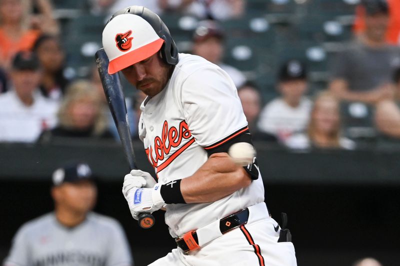 Apr 15, 2024; Baltimore, Maryland, USA;  Baltimore Orioles third baseman Jordan Westburg  moves away from a inside pitch during the third inning against the Minnesota Twins at Oriole Park at Camden Yards. Mandatory Credit: Tommy Gilligan-USA TODAY Sports