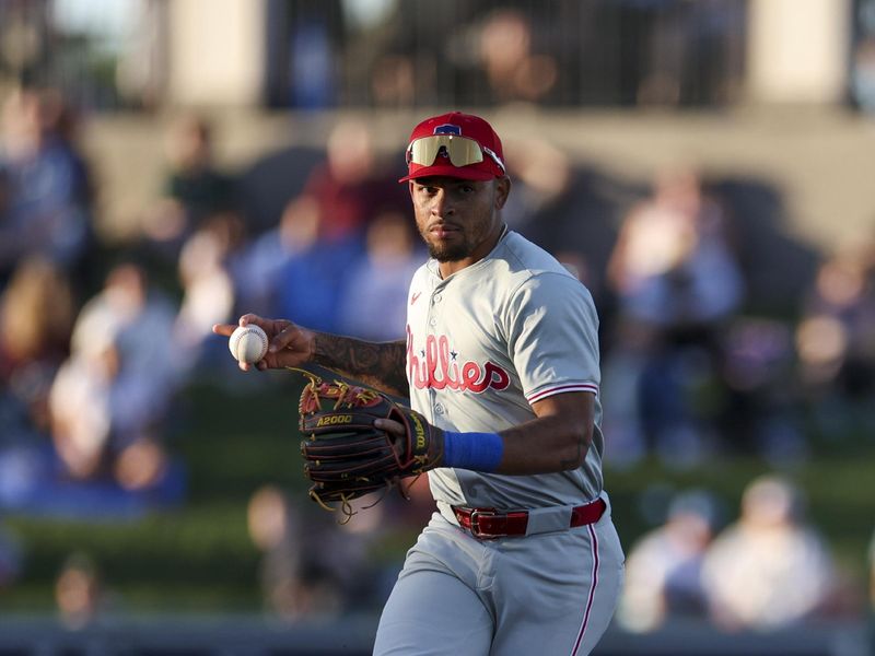 Mar 19, 2024; Lakeland, Florida, USA;  Philadelphia Phillies shortstop Edmundo Sosa (33) throws to first for an out against the Detroit Tigers in the fourth inning at Publix Field at Joker Marchant Stadium. Mandatory Credit: Nathan Ray Seebeck-USA TODAY Sports