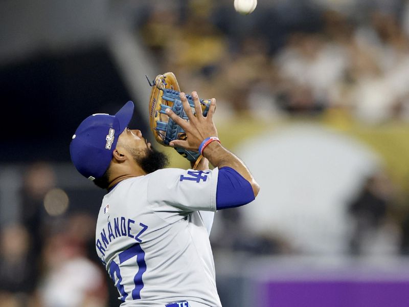 Oct 9, 2024; San Diego, California, USA; Los Angeles Dodgers outfielder Teoscar Hernandez (37) makes a catch in the seventh inning against the San Diego Padres during game four of the NLDS for the 2024 MLB Playoffs at Petco Park. Mandatory Credit: David Frerker-Imagn Images