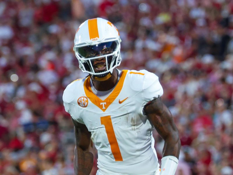 Sep 21, 2024; Norman, Oklahoma, USA;  Tennessee Volunteers wide receiver Dont'e Thornton Jr. (1) reacts after scoring a touchdown during the first quarter against the Oklahoma Sooners at Gaylord Family-Oklahoma Memorial Stadium. Mandatory Credit: Kevin Jairaj-Imagn Images