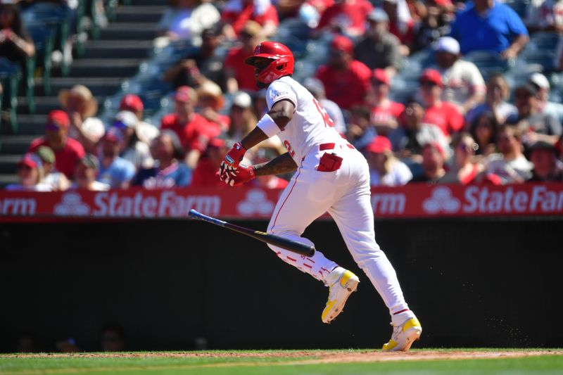 Apr 6, 2025; Anaheim, California, USA; Los Angeles Angels right fielder Jorge Soler (12) hits a solo home run against the Cleveland Guardians during the sixth inning at Angel Stadium. Mandatory Credit: Gary A. Vasquez-Imagn Images