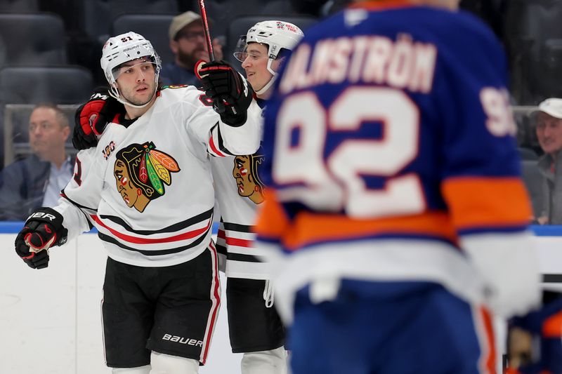 Mar 24, 2026; Elmont, New York, USA; Chicago Blackhawks center Frank Nazar (91) celebrates his goal against the New York Islanders during the second period at UBS Arena. Mandatory Credit: Brad Penner-Imagn Images
