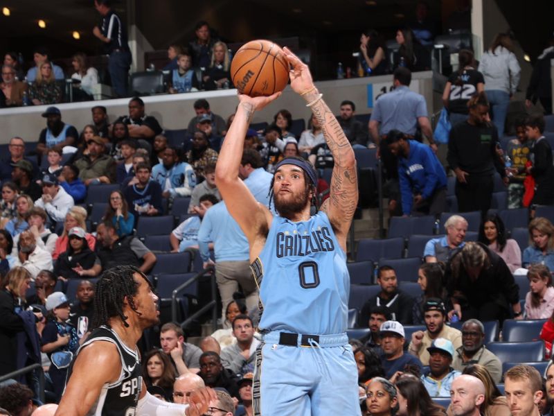 MEMPHIS, TN - APRIL 9: Timmy Allen #0 of the Memphis Grizzlies shoots a three point basket against the San Antonio Spurs on April 9, 2024 at FedExForum in Memphis, Tennessee. NOTE TO USER: User expressly acknowledges and agrees that, by downloading and or using this photograph, User is consenting to the terms and conditions of the Getty Images License Agreement. Mandatory Copyright Notice: Copyright 2024 NBAE (Photo by Joe Murphy/NBAE via Getty Images)