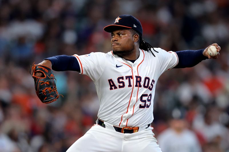 Aug 18, 2024; Houston, Texas, USA; Houston Astros starting pitcher Framber Valdez (59) delivers a pitch against the Chicago White Sox during the sixth inning at Minute Maid Park. Mandatory Credit: Erik Williams-USA TODAY Sports