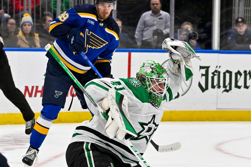 Dec 27, 2023; St. Louis, Missouri, USA;  Dallas Stars goaltender Scott Wedgewood (41) makes a glove save against the St. Louis Blues during the second period at Enterprise Center. Mandatory Credit: Jeff Curry-USA TODAY Sports