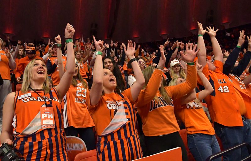 Jan 31, 2023; Champaign, Illinois, USA; The Illinois fighting Illini student fans known as the    Orange Crush    cheer on their team during the first half against the Nebraska Cornhuskers at State Farm Center. Mandatory Credit: Ron Johnson-USA TODAY Sports