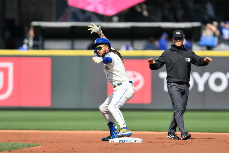 Sep 17, 2023; Seattle, Washington, USA; Seattle Mariners shortstop J.P. Crawford (3) celebrates after hitting a double against the Los Angeles Dodgers during the first inning at T-Mobile Park. Mandatory Credit: Steven Bisig-USA TODAY Sports