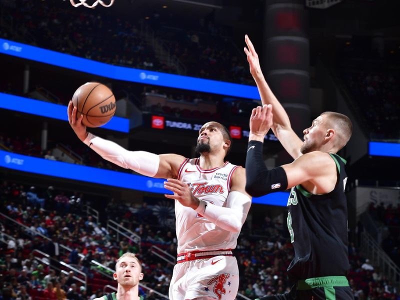 HOUSTON, TX - JANUARY 21: Dillon Brooks #9 of the Houston Rockets drives to the basket during the game against the Boston Celtics on January 21, 2024 at the Toyota Center in Houston, Texas. NOTE TO USER: User expressly acknowledges and agrees that, by downloading and or using this photograph, User is consenting to the terms and conditions of the Getty Images License Agreement. Mandatory Copyright Notice: Copyright 2024 NBAE (Photo by Logan Riely/NBAE via Getty Images)