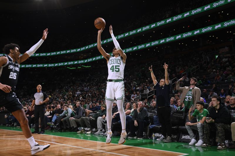 BOSTON, MA - JANUARY 17: Dalano Banton #45 of the Boston Celtics shoots a three point basket during the game against the San Antonio Spurs on January 17, 2024 at the TD Garden in Boston, Massachusetts. NOTE TO USER: User expressly acknowledges and agrees that, by downloading and or using this photograph, User is consenting to the terms and conditions of the Getty Images License Agreement. Mandatory Copyright Notice: Copyright 2024 NBAE  (Photo by Brian Babineau/NBAE via Getty Images)