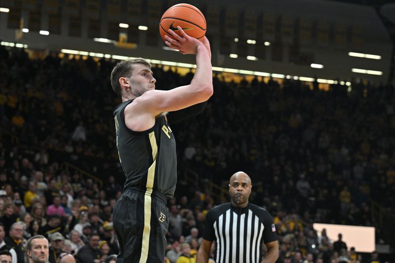 Jan 20, 2024; Iowa City, Iowa, USA; Purdue Boilermakers guard Braden Smith (3) shoots a three point basket against the Iowa Hawkeyes during the second half at Carver-Hawkeye Arena. Mandatory Credit: Jeffrey Becker-USA TODAY Sports