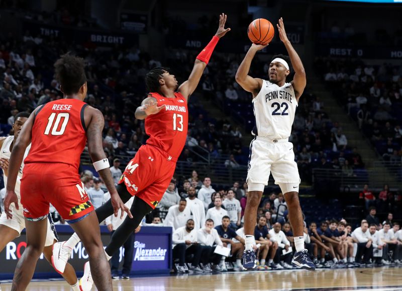 Mar 5, 2023; University Park, Pennsylvania, USA; Penn State Nittany Lions guard Jalen Pickett (22) shoots the ball as Maryland Terrapins guard Hakim Hart (13) defends during the first half at Bryce Jordan Center. Mandatory Credit: Matthew OHaren-USA TODAY Sports