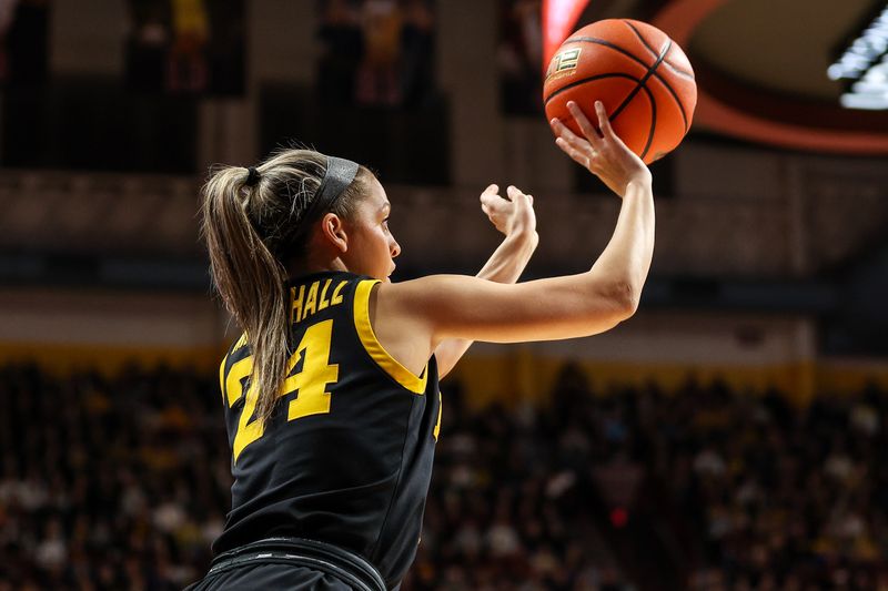 Feb 28, 2024; Minneapolis, Minnesota, USA; Iowa Hawkeyes guard Gabbie Marshall (24) shoots against the Minnesota Golden Gophers during the second half at Williams Arena. Mandatory Credit: Matt Krohn-USA TODAY Sports