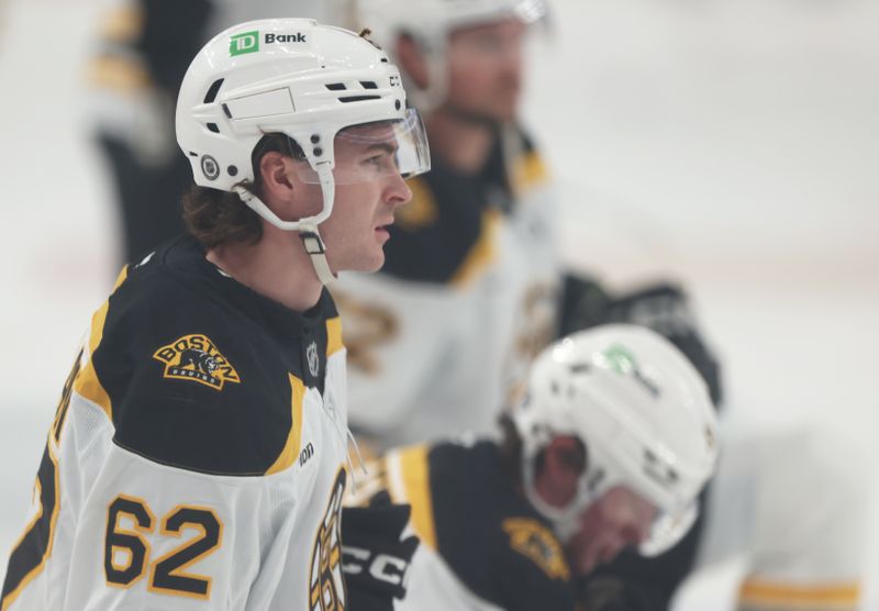 Apr 13, 2025; Pittsburgh, Pennsylvania, USA;  Boston Bruins center Riley Duran (62) looks on during warm ups before the game against the Pittsburgh Penguins at PPG Paints Arena. Mandatory Credit: Charles LeClaire-Imagn Images