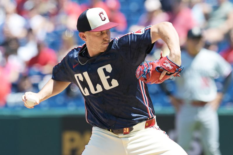 May 19, 2024; Cleveland, Ohio, USA; Cleveland Guardians starting pitcher Tanner Bibee (28) throws a pitch during the first inning against the Minnesota Twins at Progressive Field. Mandatory Credit: Ken Blaze-USA TODAY Sports