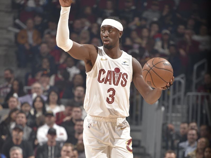 CLEVELAND, OH - MARCH 11: Caris LeVert #3 of the Cleveland Cavaliers handles the ball during the game against the Phoenix Suns on March 11, 2024 at Rocket Mortgage FieldHouse in Cleveland, Ohio. NOTE TO USER: User expressly acknowledges and agrees that, by downloading and/or using this Photograph, user is consenting to the terms and conditions of the Getty Images License Agreement. Mandatory Copyright Notice: Copyright 2024 NBAE (Photo by David Liam Kyle/NBAE via Getty Images)