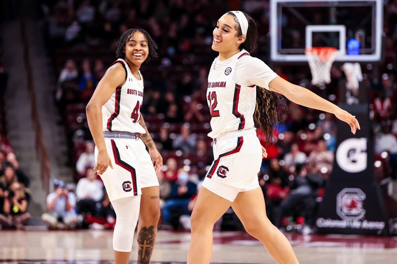 Feb 2, 2023; Columbia, South Carolina, USA; South Carolina Gamecocks guard Kierra Fletcher (41) and guard Brea Beal (12) celebrate a play against the Kentucky Wildcats in the first half at Colonial Life Arena. Mandatory Credit: Jeff Blake-USA TODAY Sports