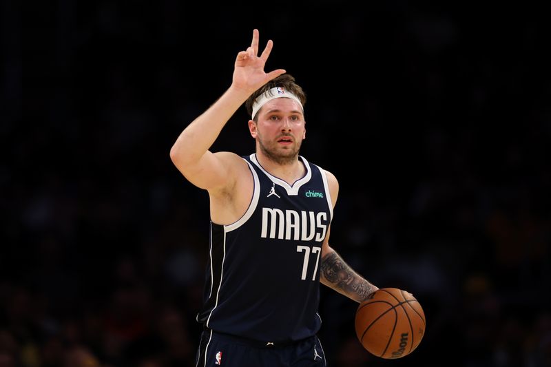 LOS ANGELES, CALIFORNIA - JANUARY 17: Luka Doncic #77 of the Dallas Mavericks calls out a play during the second quarter against the Los Angeles Lakers at Crypto.com Arena on January 17, 2024 in Los Angeles, California. NOTE TO USER: User expressly acknowledges and agrees that, by downloading and or using this photograph, User is consenting to the terms and conditions of the Getty Images License Agreement. (Photo by Katelyn Mulcahy/Getty Images)