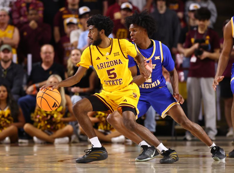 Jan 21, 2026; Tempe, Arizona, USA; Arizona State Sun Devils guard Maurice Odum (5) against the West Virginia Mountaineers in the first half at Desert Financial Arena. Mandatory Credit: Mark J. Rebilas-Imagn Images