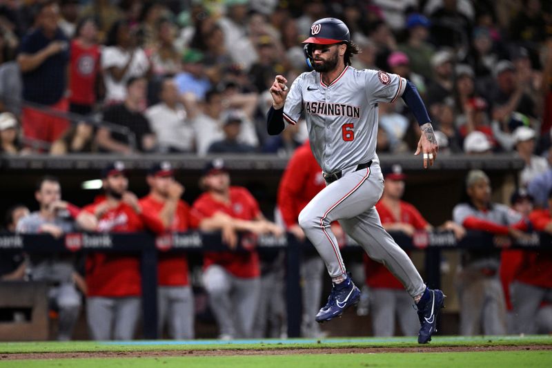 Jun 24, 2024; San Diego, California, USA; Washington Nationals left fielder Jesse Winker (6) advances home to score a run during the tenth inning against the San Diego Padres at Petco Park. Mandatory Credit: Orlando Ramirez-USA TODAY Sports