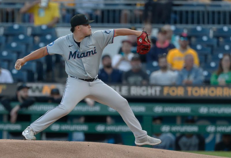 Sep 9, 2024; Pittsburgh, Pennsylvania, USA;  Miami Marlins  starting pitcher Valente Bellozo (83) delivers a pitch against the Pittsburgh Pirates during the first inning at PNC Park. Mandatory Credit: Charles LeClaire-Imagn Images