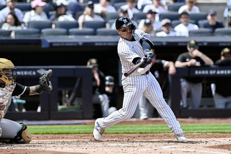 May 19, 2024; Bronx, New York, USA; New York Yankees catcher Jose Trevino (39) hits a two RBI single against the Chicago White Sox during the second inning at Yankee Stadium. Mandatory Credit: John Jones-USA TODAY Sports