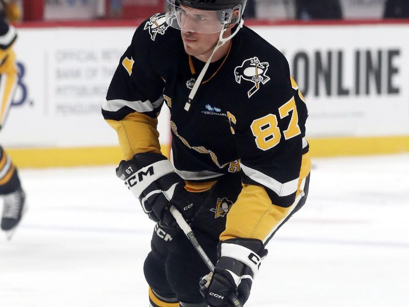 Mar 14, 2024; Pittsburgh, Pennsylvania, USA; Pittsburgh Penguins center Sidney Crosby (87) warms up before the game against the San Jose Sharks at PPG Paints Arena. Mandatory Credit: Charles LeClaire-USA TODAY Sports